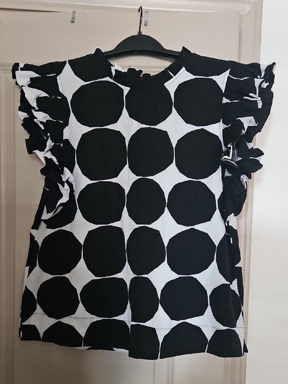 JODIFL Black and White Polka Dot Ruffle Sleeve Top
